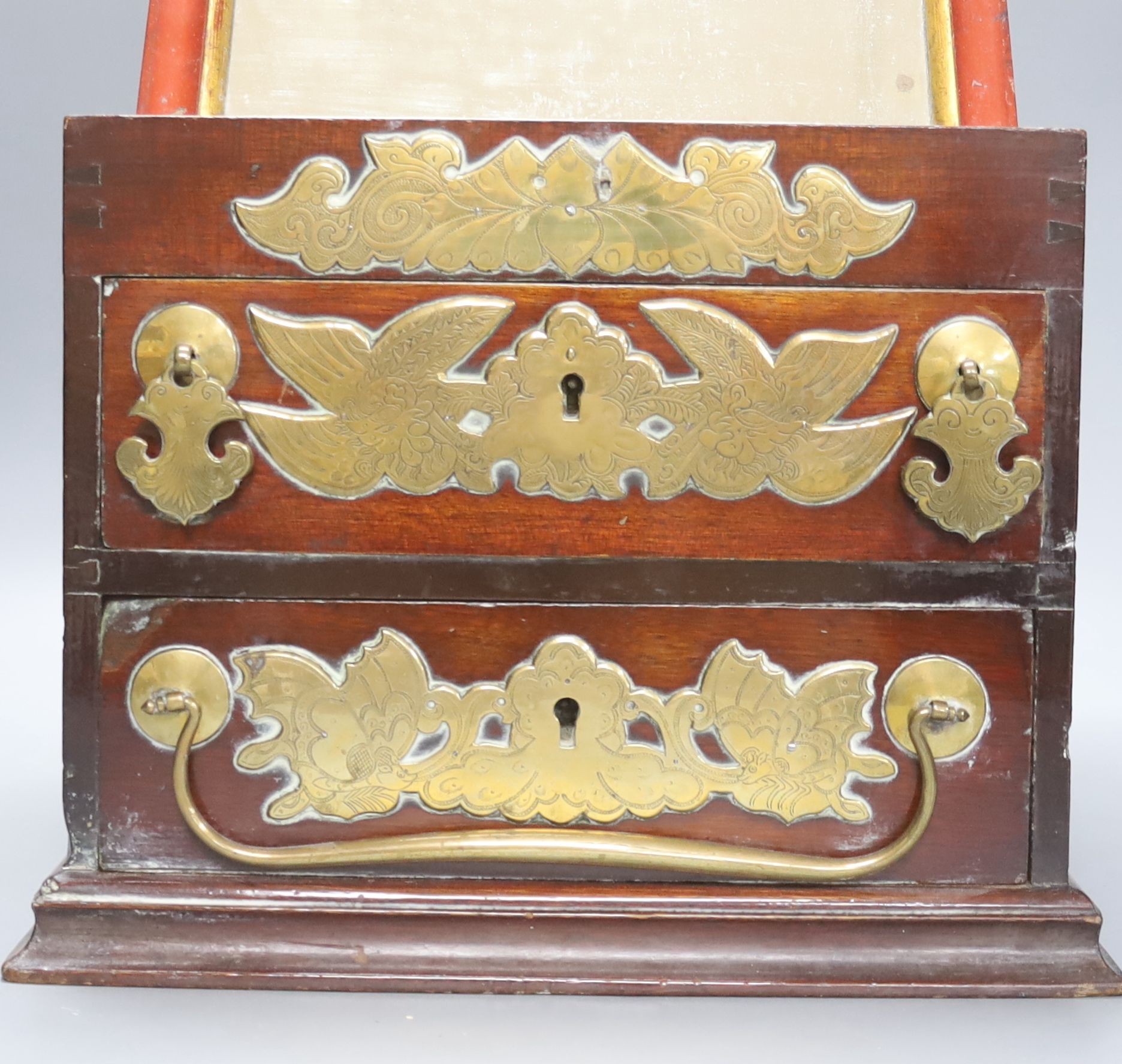 A Chinese brass mounted hardwood dressing table chest, width 28cm height 22cm